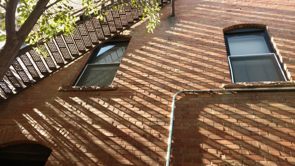 light, shadows, fire escape, Colorado Springs, Old Colorado City, originality, Henry Van Dyke,